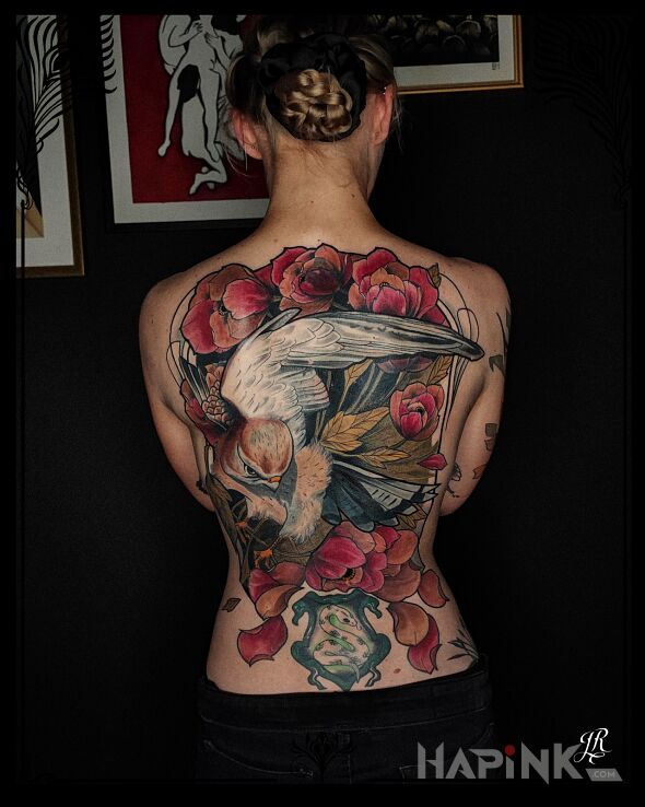 Tattoo Regression in flowers motif and neo-traditional style on the back