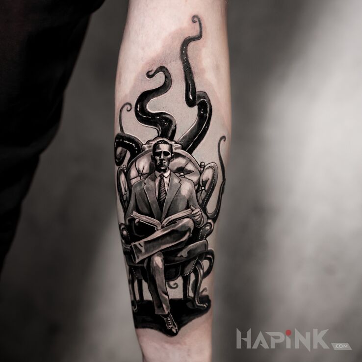 Tattoo H.P. Lovecraft in fantasy motif and realistic style On the arm