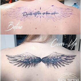 Tattoo Cover up the inscription on the wings on the back motif: black and gray style: realistic