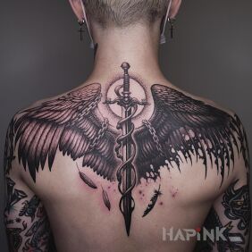 Tattoo Demonic and angelic side on the back motif: objects style: realistic