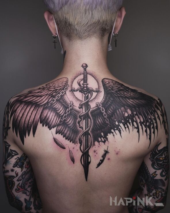 Tattoo Demoniczna i anielska strona in objects motif and realistic style on the back