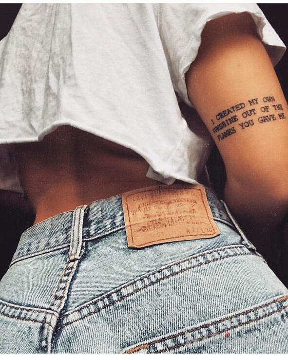 Tattoo Moje słońce in lettering motif on the upper arm