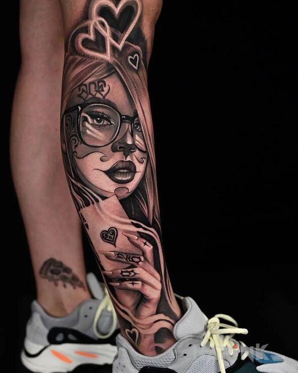 Tattoo Asa wyjęła z rękawa in black and gray motif and realistic style on the calf