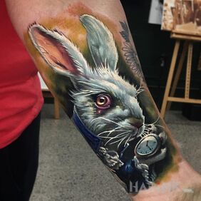 Tattoo White rabbit on the forearm motif: animals