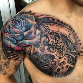 Tattoo Roza and the clock on the upper arm motif: flowers style: realistic