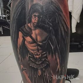 Tattoo Little Angel on the calf motif: characters style: realistic