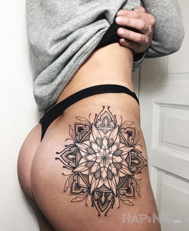 Tattoo Mandala in mandalas motif on the buttocks