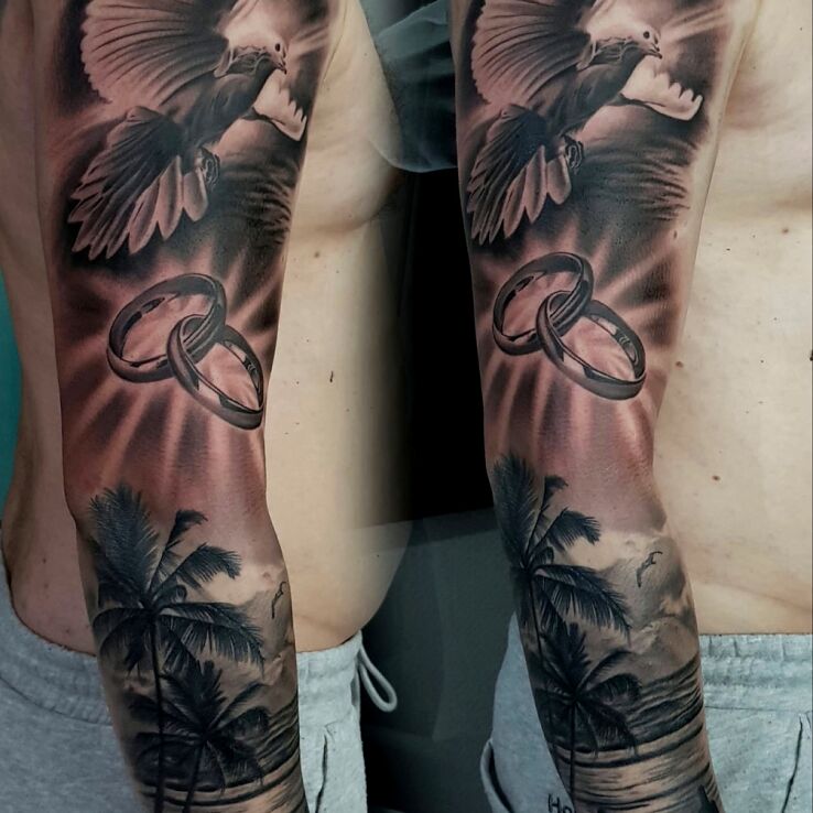 Tatuaż gołąb w motywie miłosne i stylu realistyczne na przedramieniu
