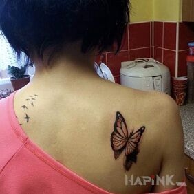 Tattoo Butterfly on the back on the shoulder blades motif: butterflies style: realistic