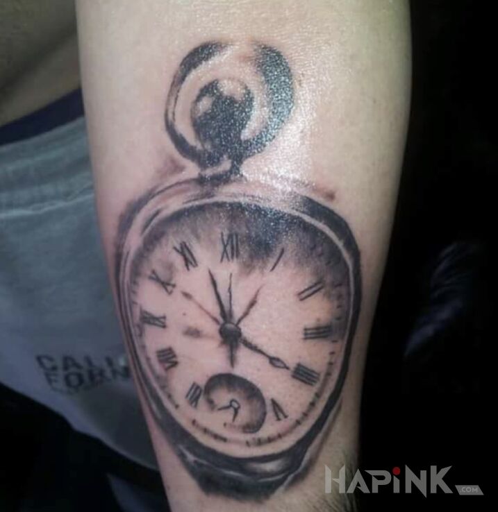 Tattoo Poczatek in objects motif and realistic style On the arm