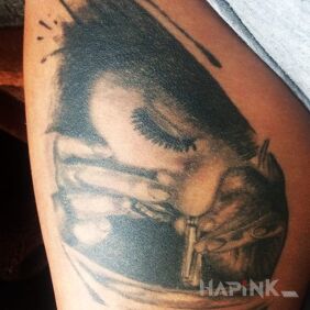 Tattoo My baby ? on the leg motif: characters