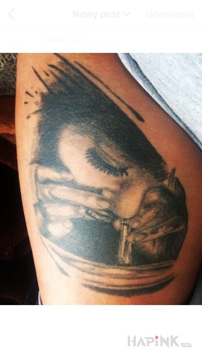 Tattoo Moje maleństwo ? in characters motif on the leg