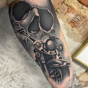 Tattoo Death Ride on the bicep motif: black and gray style: realistic