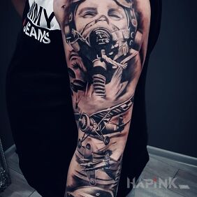 Tattoo Sleeve on the forearm motif: war style: realistic