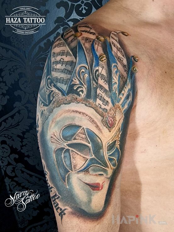 Tattoo Carnival mask in colorful motif and realistic style On the arm