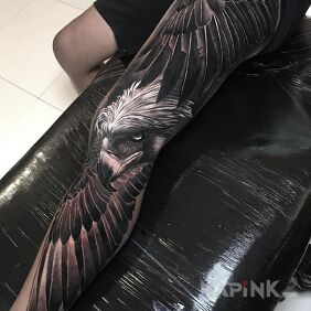 Tattoo Hey falcons on the tibia motif: animals style: realistic