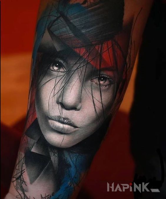 Tattoo Twarzyczka in faces motif and realistic style On the arm