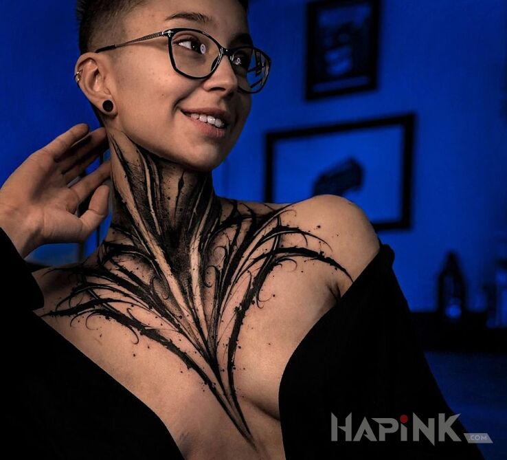 Tattoo Dark szyja in criminal lettering motif and blackwork / blackout style on the throat
