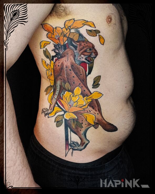 Tattoo Ryś in flowers motif and neo-traditional style on the ribs