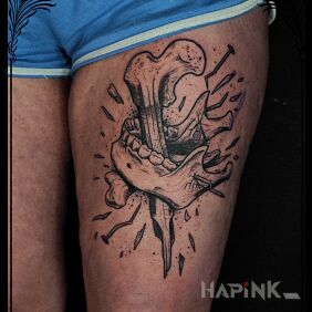 Tattoo Mandible on the thigh motif: skulls style: graphic / illustrative