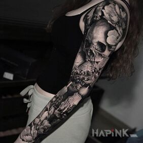 Tattoo Memento On the arm motif: skulls style: realistic