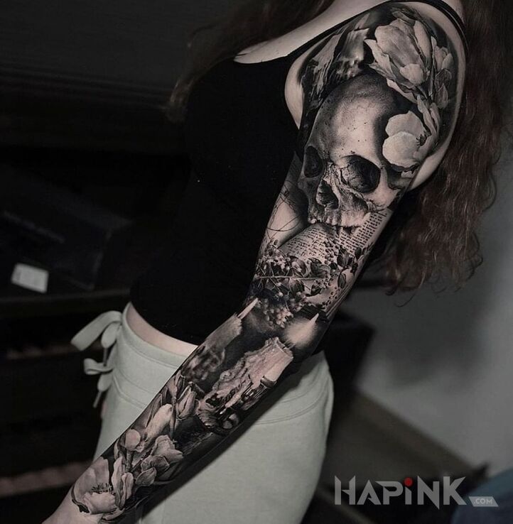 Tattoo Memento in objects motif and realistic style on the forearm