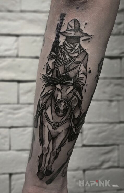 Tattoo LakiLuk in black and gray motif and graphic / illustrative style On the arm