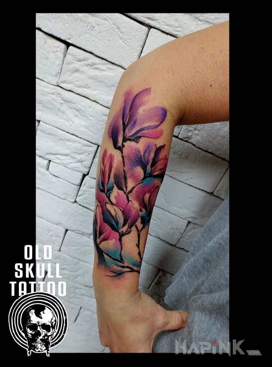 Tattoo Flowers in flowers motif and Watercolor style on the forearm