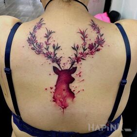 Tattoo Watercolor deer on the back motif: colorful style: Watercolor