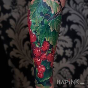 Tattoo Red currants on the forearm motif: 3D style: realistic