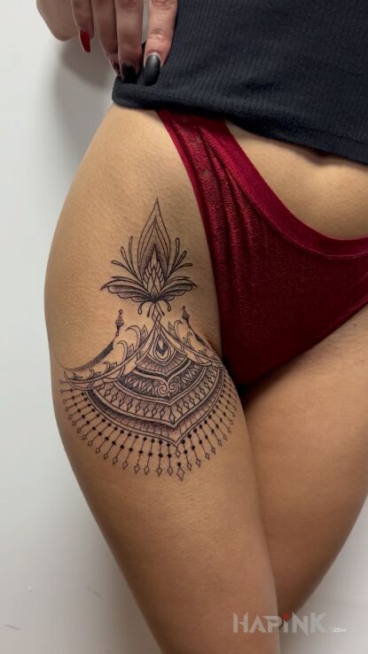 Tattoo Cudo cudeńko in black and gray motif on the leg