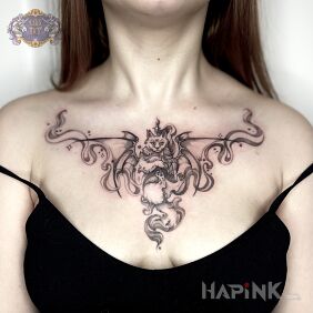 Tattoo Magic cat on the chest motif: black and gray style: graphic / illustrative