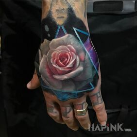 Tattoo Beautiful rose on the hand motif: flowers style: realistic