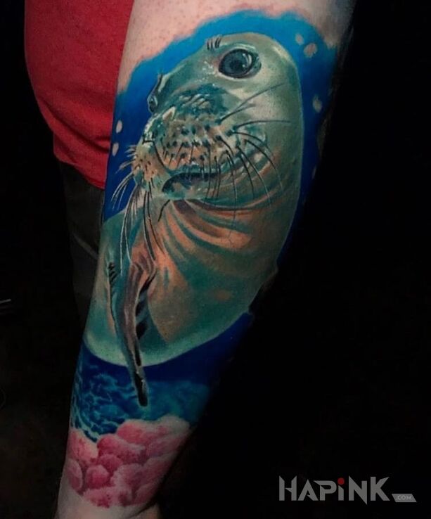 Tattoo Foka in 3D motif and realistic style on the forearm