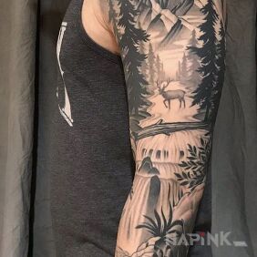 Tattoo Deer in the mountains On the arm motif: nature style: realistic