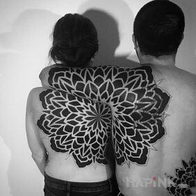 Tattoo Connected on the upper arm motif: Love