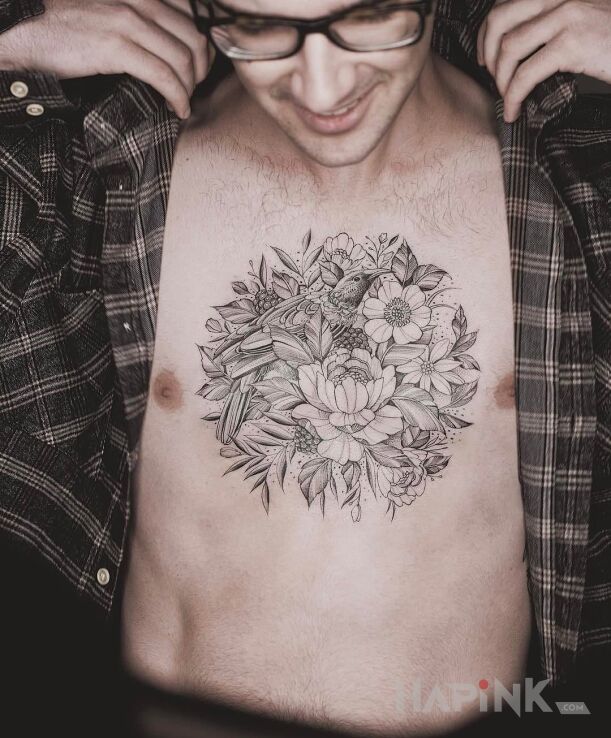 Tattoo Klata w kwiatki in flowers motif on the chest