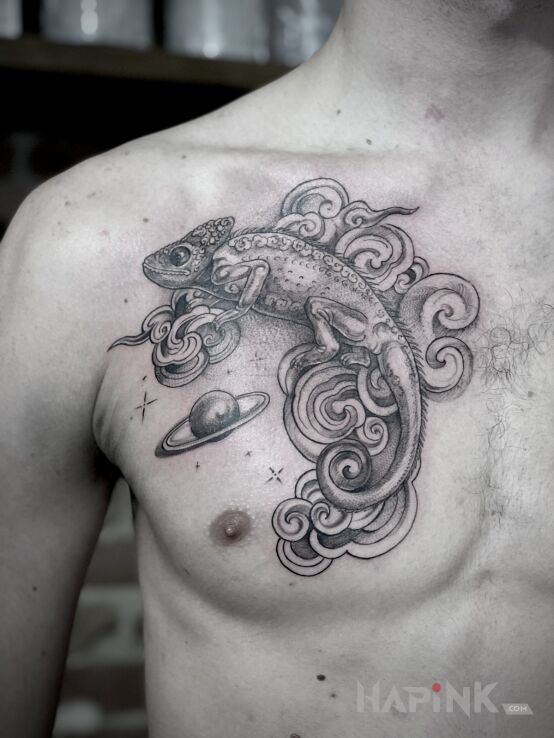Tattoo Kameleon in black and gray motif and graphic / illustrative style on the chest