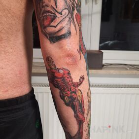 Tattoo Iron Man on the forearm motif: colorful style: cartoon / comic book