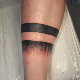 Tattoo Armband on the calf on the leg motif: other style: blackwork / blackout
