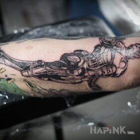 Tattoo Iron man bw On the arm motif: black and gray style: graphic / illustrative