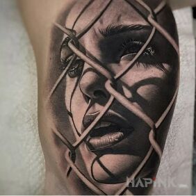 Tattoo Glance On the arm motif: faces style: realistic
