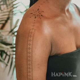 Tattoo Embroidery on the shoulder motif: black and gray style: minimalistic