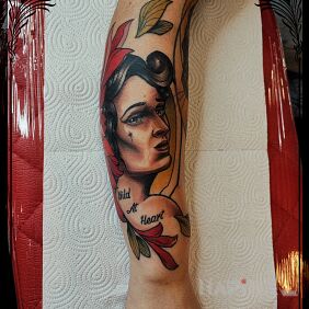 Tattoo Wild at heart on the forearm motif: floral style: neo-traditional