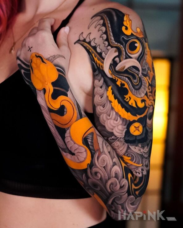 Tattoo Bestia z pięknym kolorem in sleeves motif and graphic / illustrative style On the arm