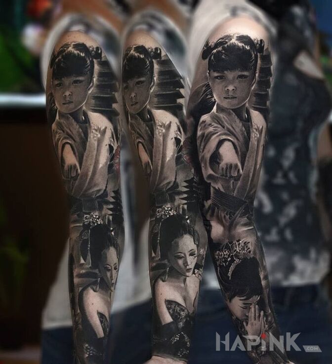 Tattoo Japan style in sleeves motif and realistic style on the upper arm