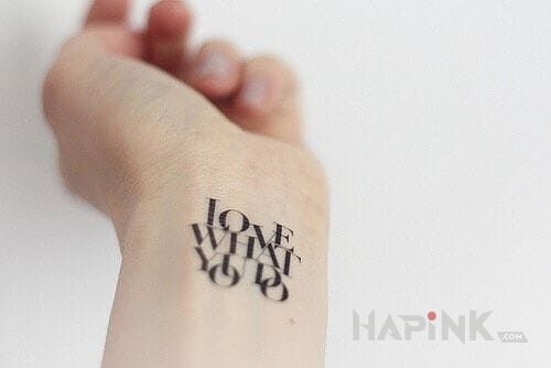 Tattoo Love what you do in lettering motif on the wrist
