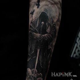 Tattoo DEATH on the forearm motif: black and gray style: realistic