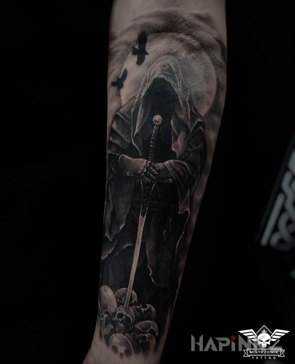 Tattoo ŚMIERĆ in skulls motif and realistic style on the forearm