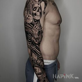 Tattoo Undead clown on the upper arm motif: characters style: graphic / illustrative